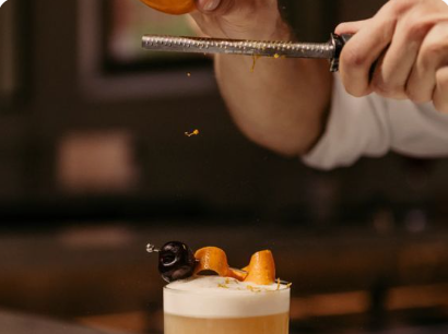 Bartender preparing gin cocktail